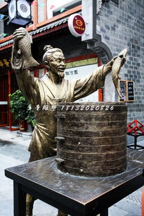 卖鱼铜雕 街边石雕的艺术与生活交融