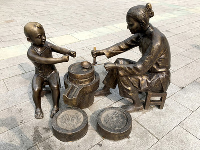 磨豆腐的石雕 凝固时光的民间艺术